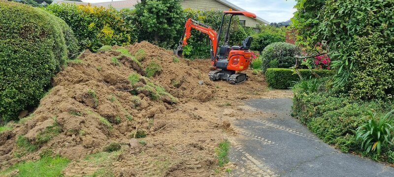 Excavator hire for garden clearing Wellington